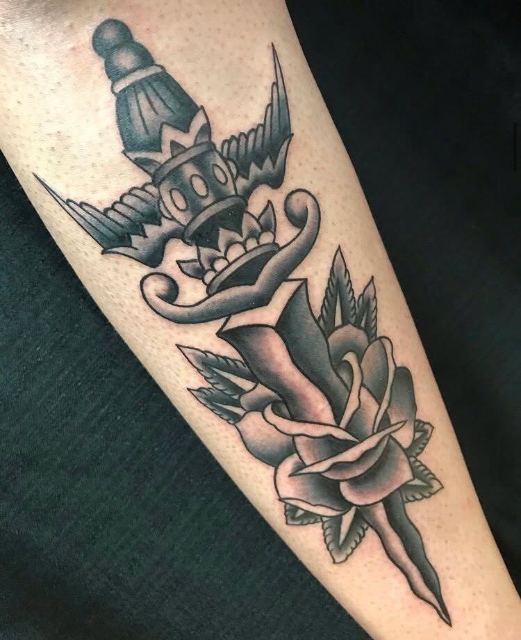 Traditional dagger and rose tattoo by Wicked Inx